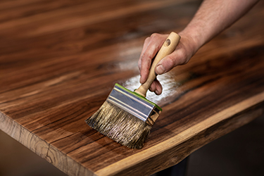 Lacquer is applied to wood furniture. Lacquers and other applications using Eastman Solus(tm) performance additives can add decades to their life.