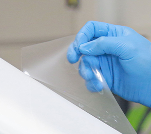 A topcoat film is applied to a car