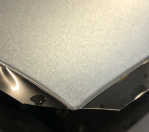 A protective film is applied to a silver vehicle