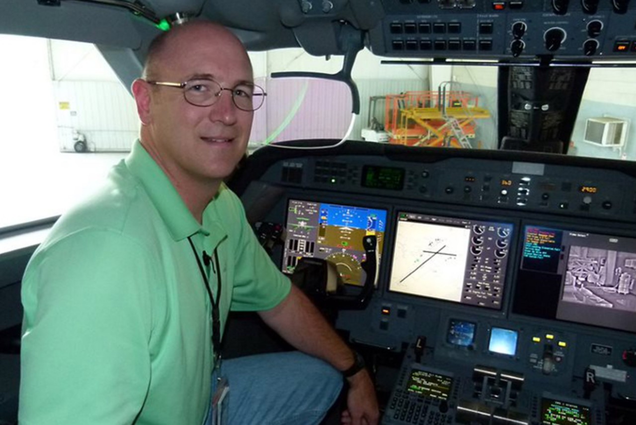 James “Mike” Egan in a plane cockpit