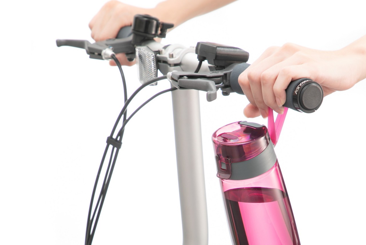 Inochi Tritan™ water bottle attached to bicycle 