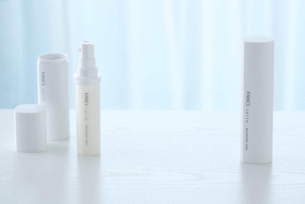 Two FANCL balancing milk bottles, showcasing how the product cartridge can be removed. Two FANCL balancing milk bottles, showcasing how the product cartridge can be removed.